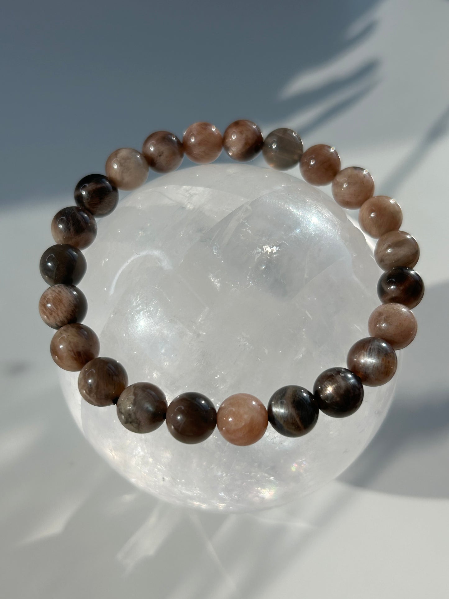 Black moon and sunstone beaded bracelet