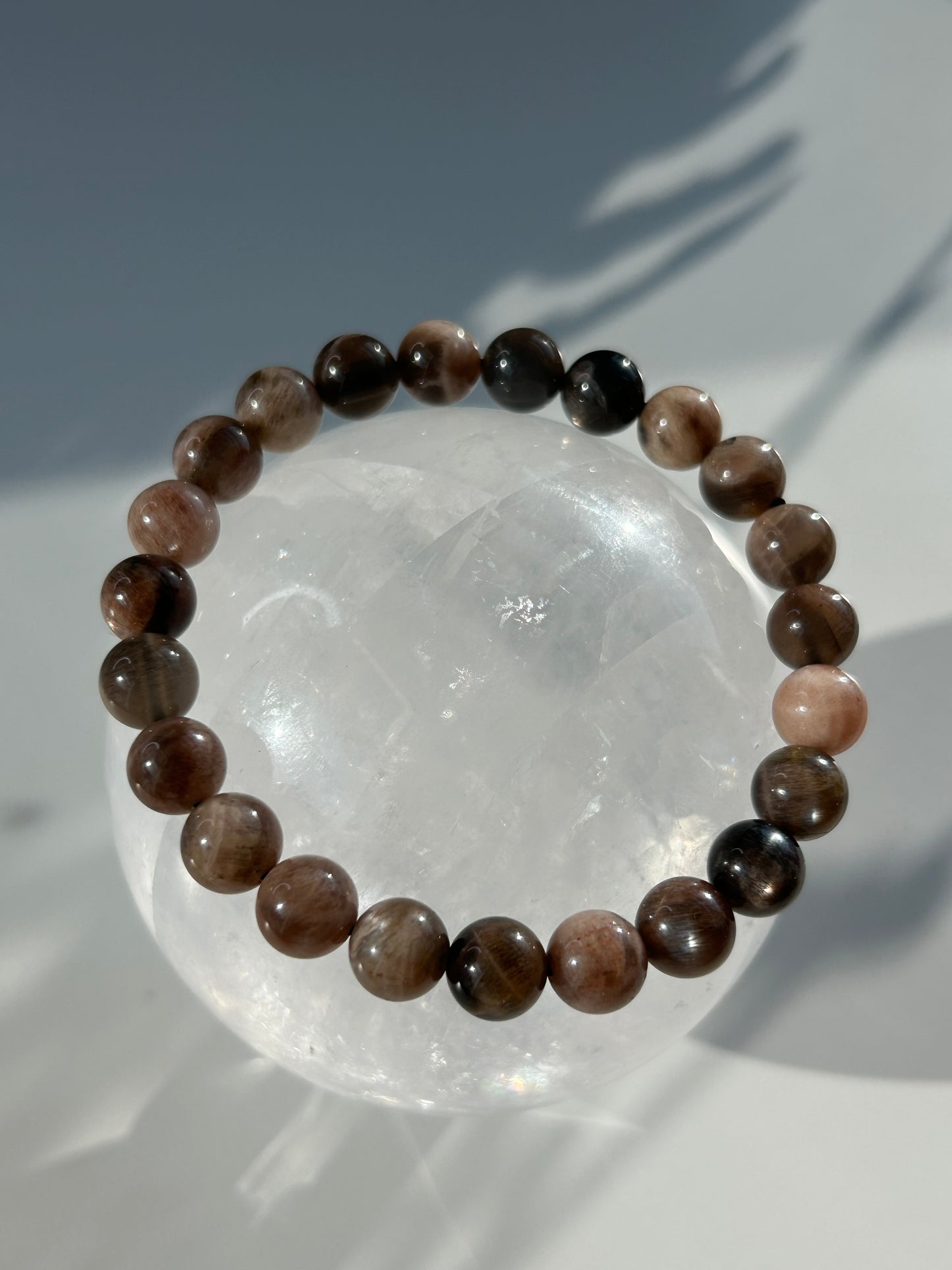 Black moon and sunstone beaded bracelet