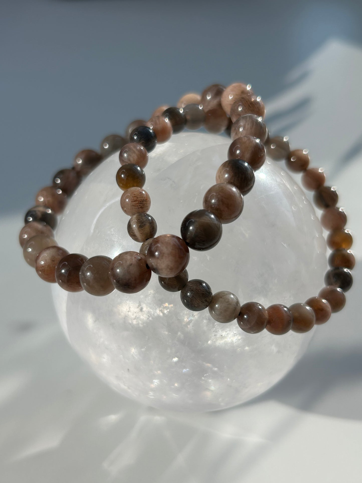 Black moon and sunstone beaded bracelet