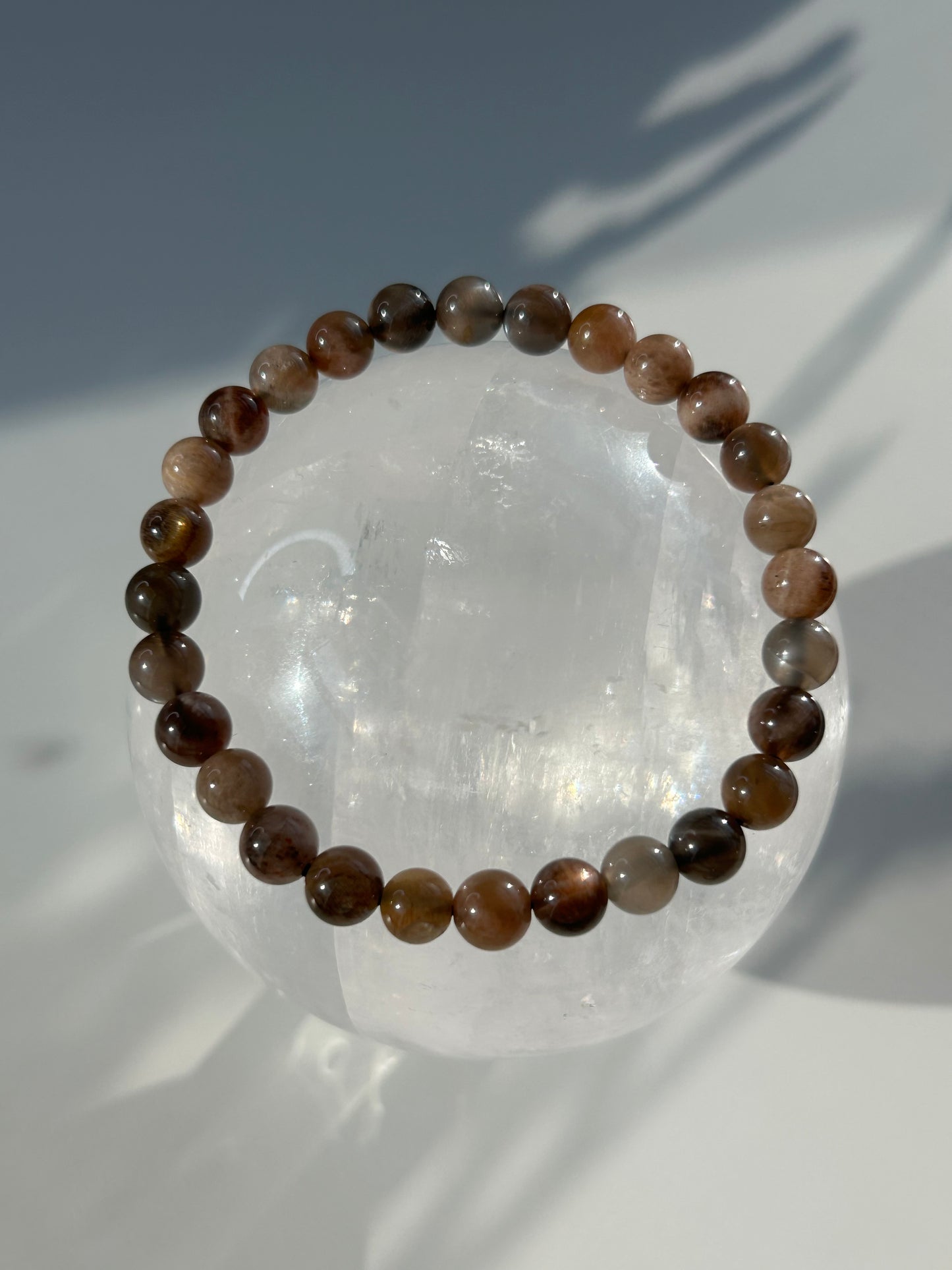 Black moon and sunstone beaded bracelet