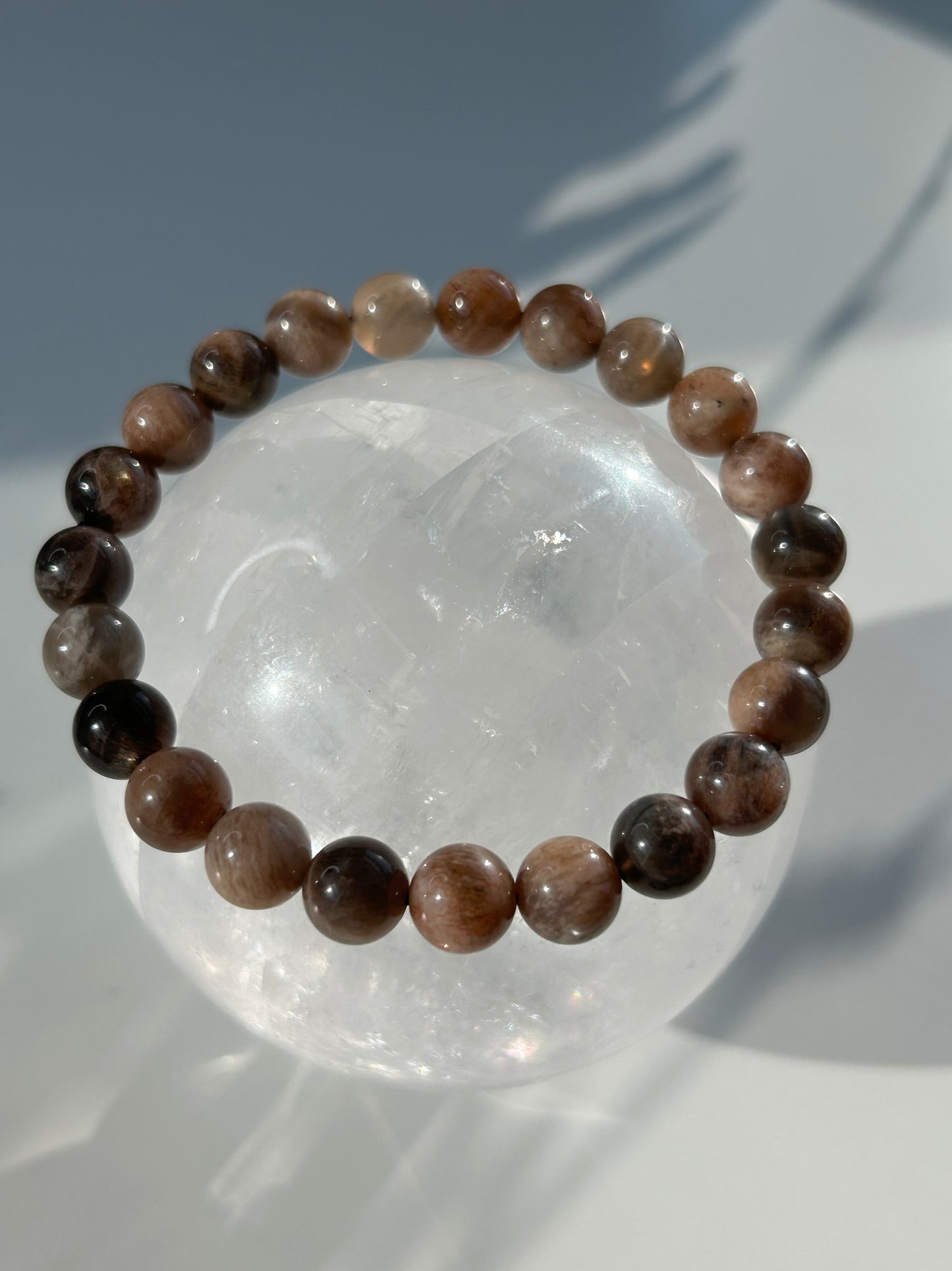 Black moon and sunstone beaded bracelet