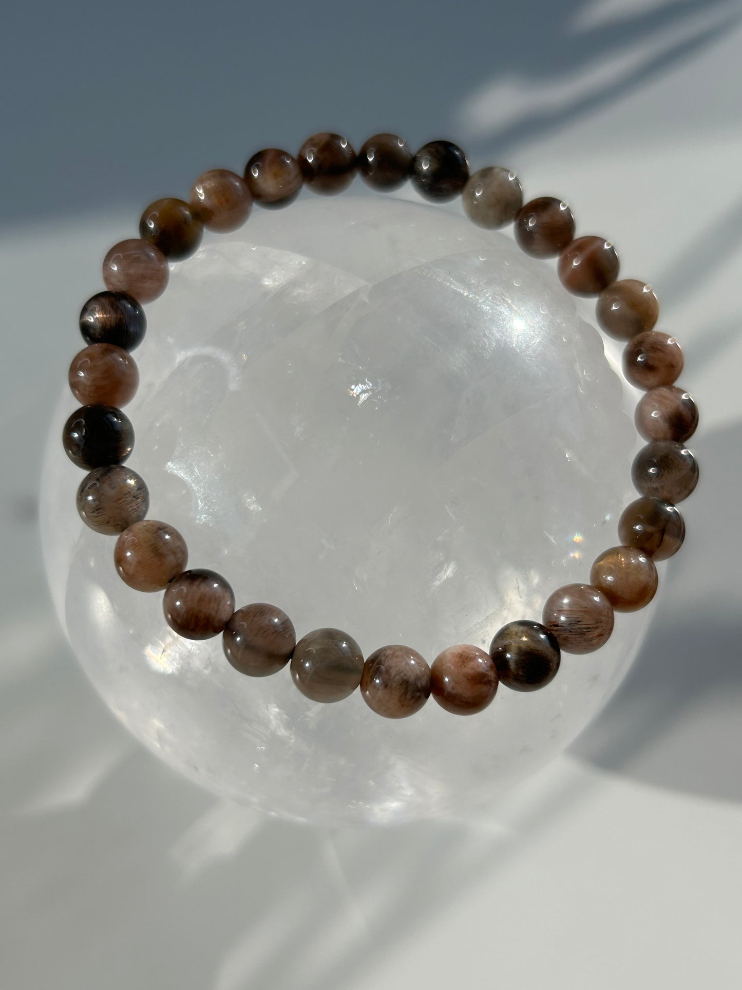 Black moon and sunstone beaded bracelet