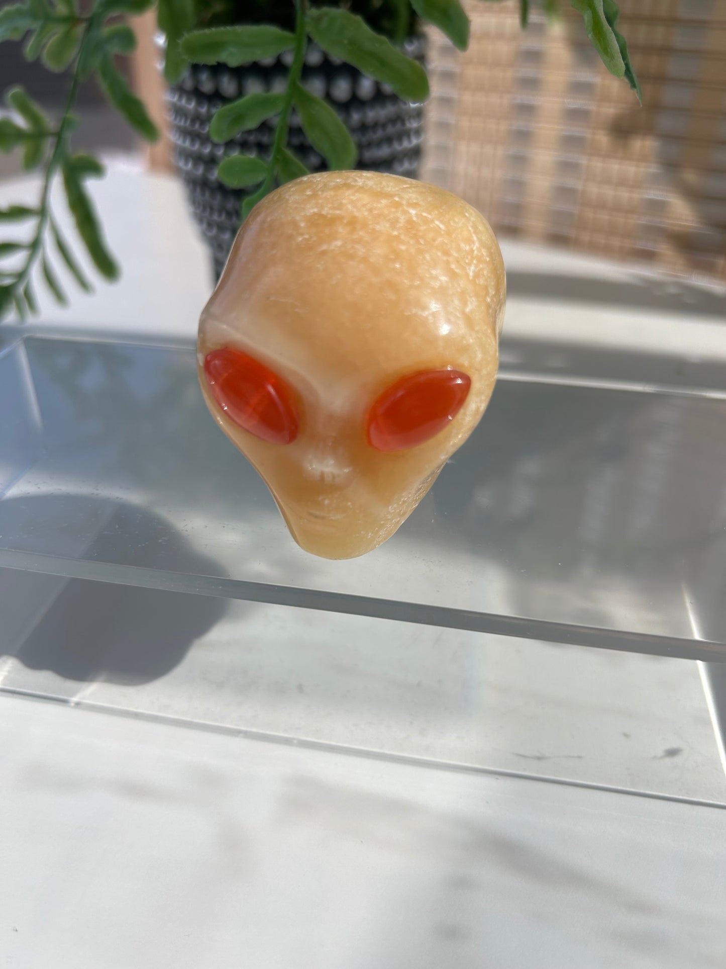 Orange Calcite Alien head carving