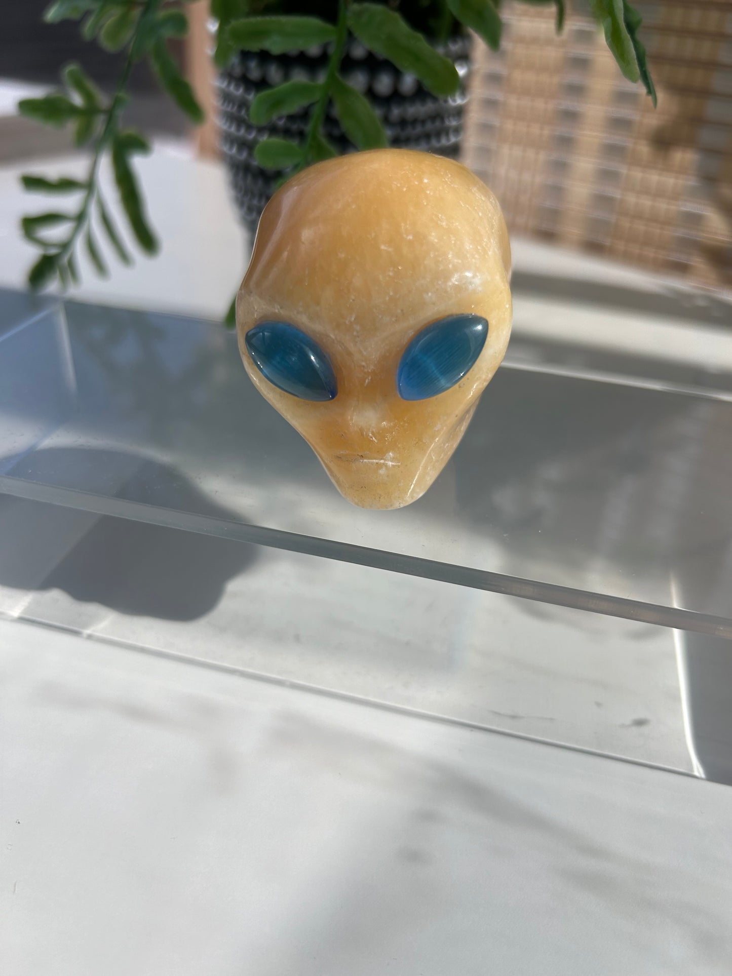 Orange Calcite Alien head carving